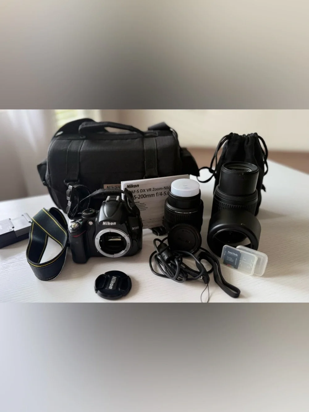 Nikon D5000 DSLR Camera + AF-S DX VR 55-200mm Lens W/ An Extra Lens